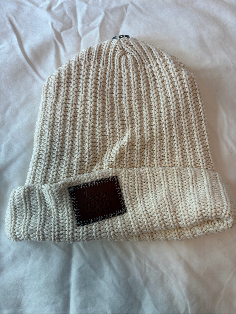 Love Your Melon Off-White Knit Beanie with Leather Logo Patch